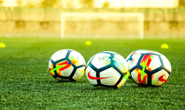 soccer balls on a playing field